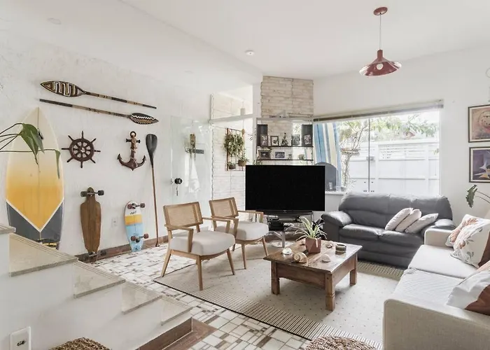 Aluguéis de temporada: Suites Mar e Lua em casa compartilhada